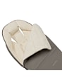 1809201110_2026_maxicosi_stroller_accessories_2in1footmuff_sand_truffle_warmthyoucantrust_zoom