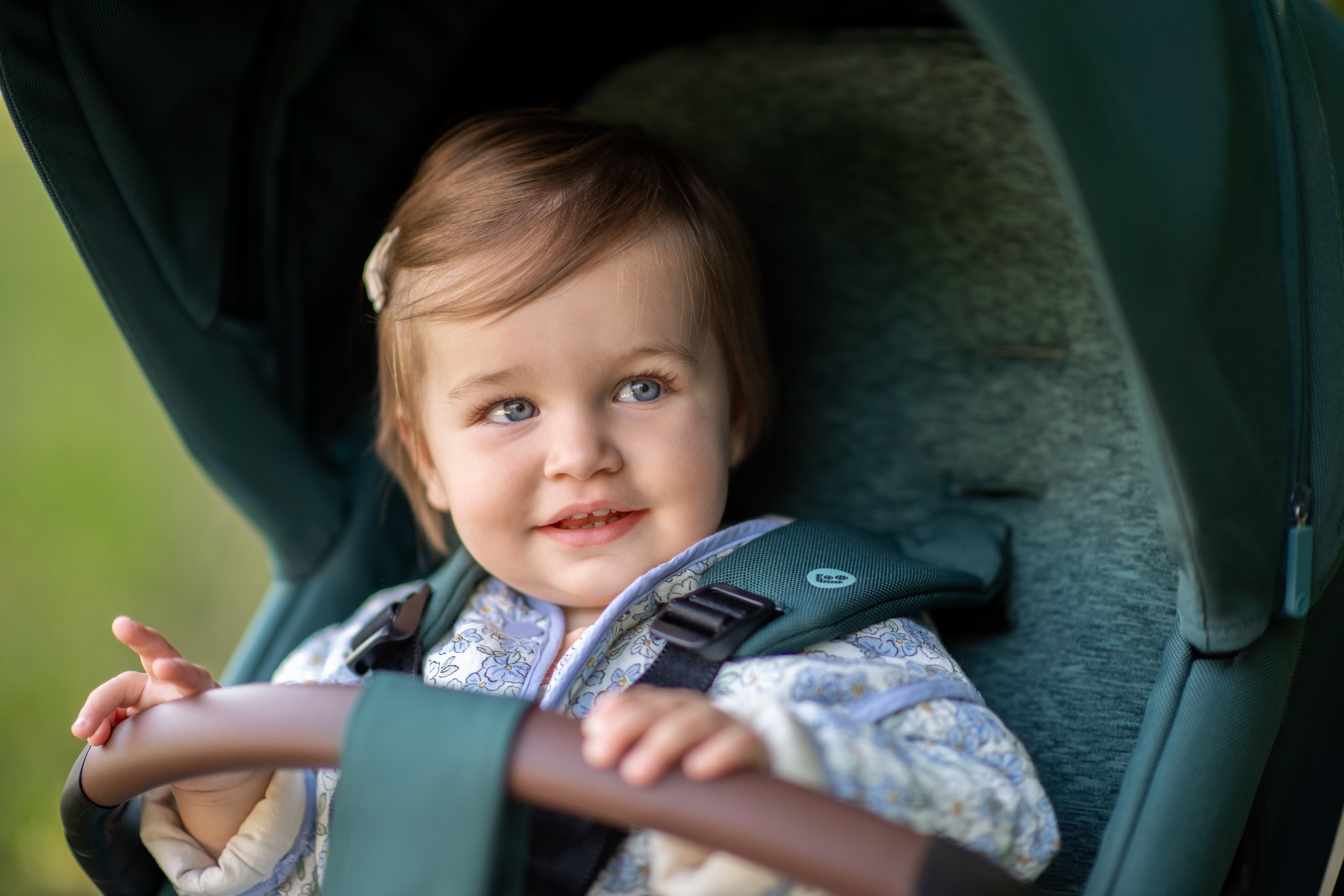 Child in stroller on sale